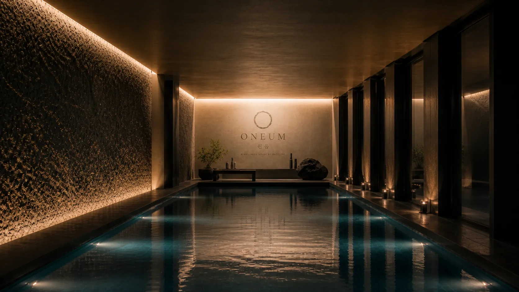 ONEUM pool — a quiet stone-clad pool with a courtyard view.
